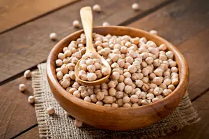 Chickpea exports comparison showing Australian and Canadian pulse trade competition with shipping containers and global supply chain logistics