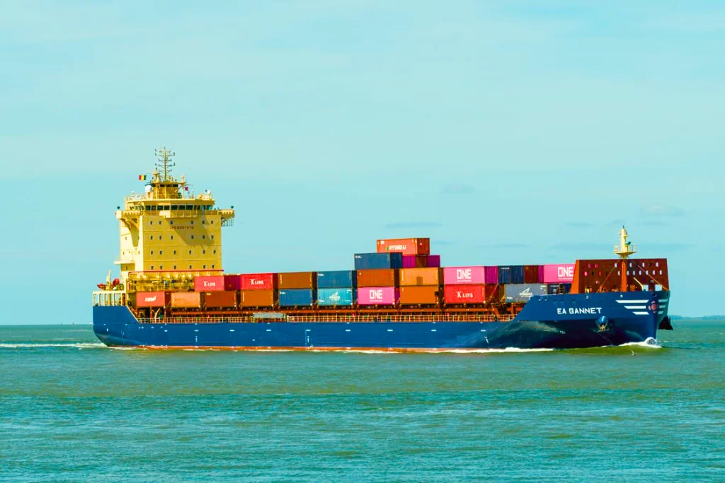 Agricultural supply chain disruption as an oil tanker transits open sea after the Strait of Hormuz closure
