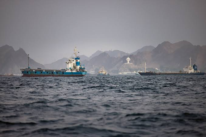 Cargo ship crossing the Strait of Hormuz during disruptions to regional trade routes